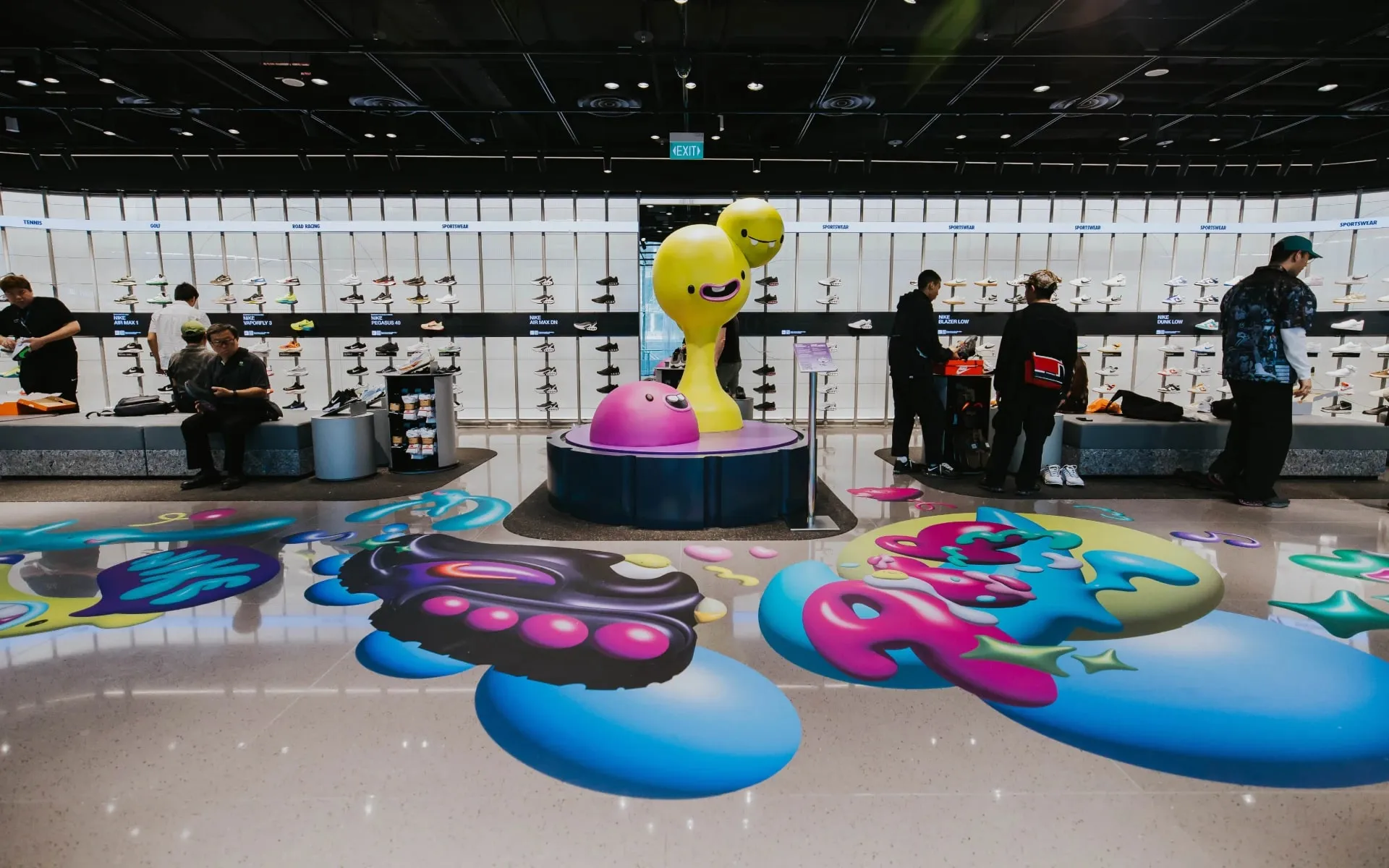 The store floor with the Air Max Dn characters across it