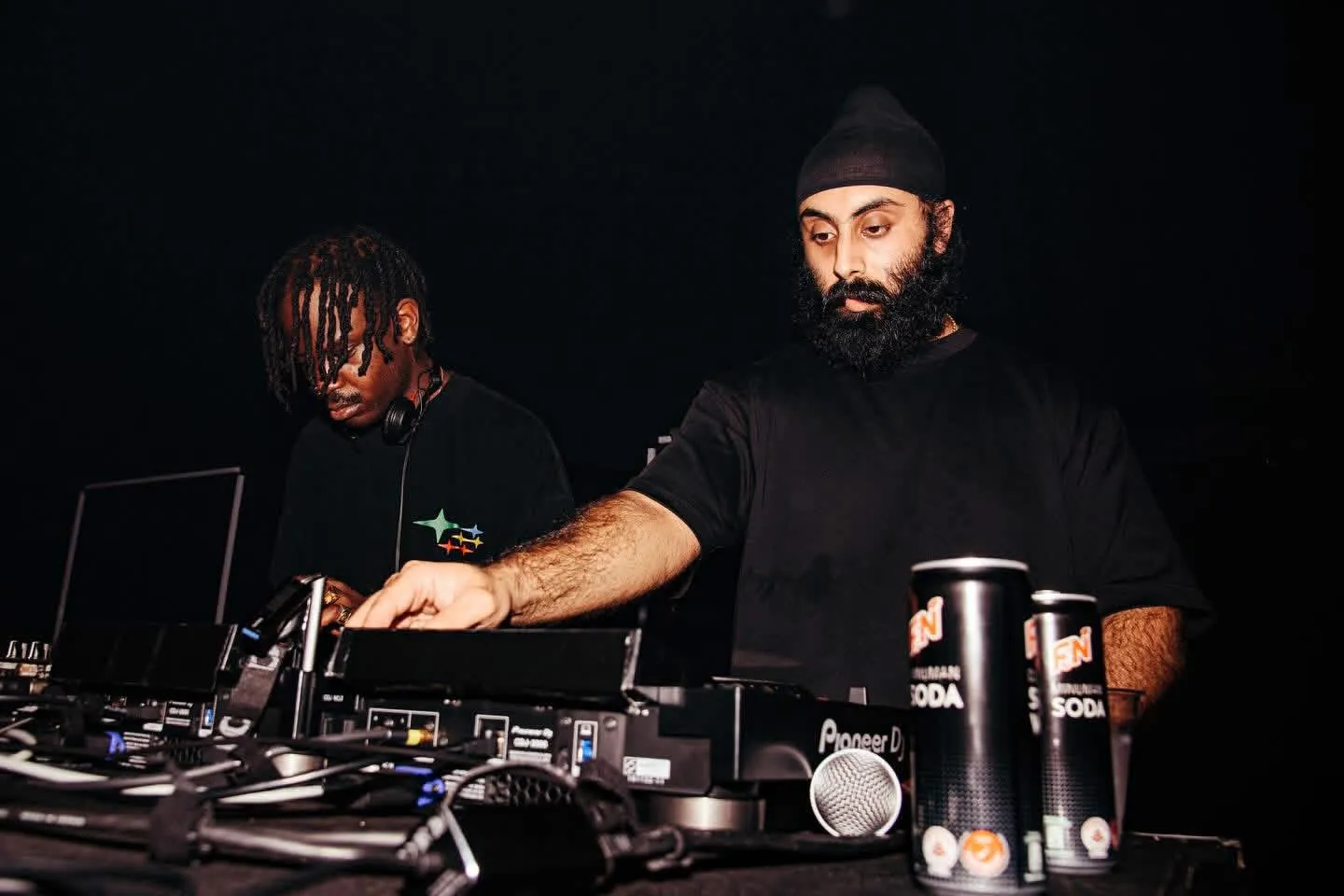 Yung Singh on the CDJs, Salut beside him