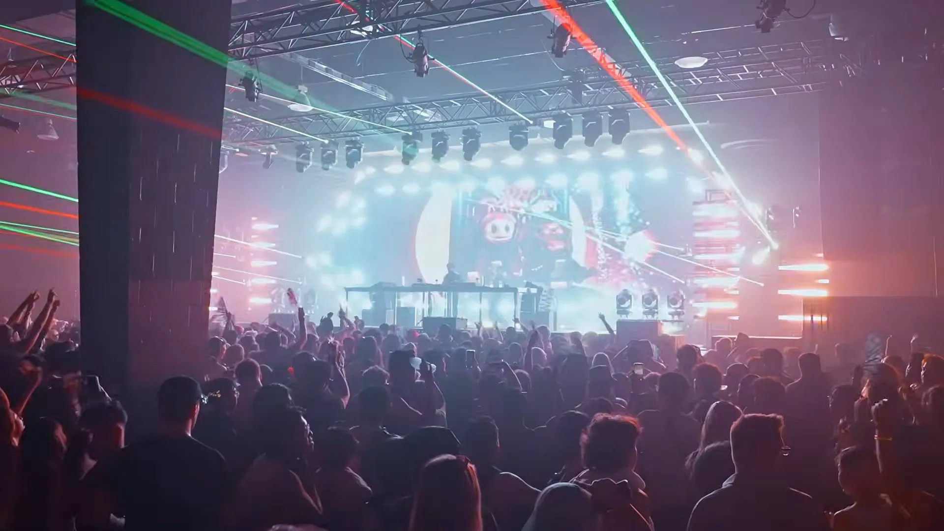 Frequency, Calgary, lasers crossing the hall over a full floor, the stage frame lit behind
